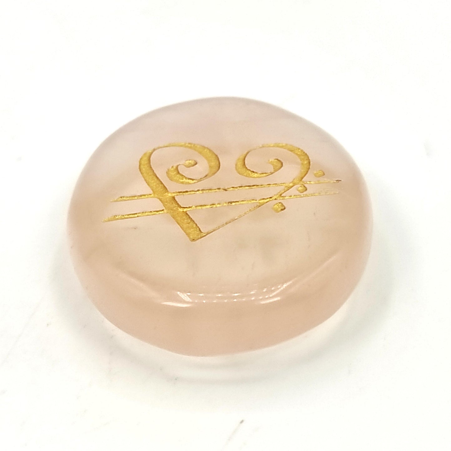rose quartz stone with zibu symbol healing reiki crystal