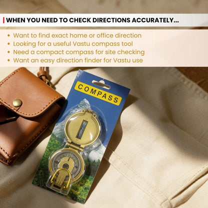 Compass held level at the centre of a room to read the facing direction as per Vastu