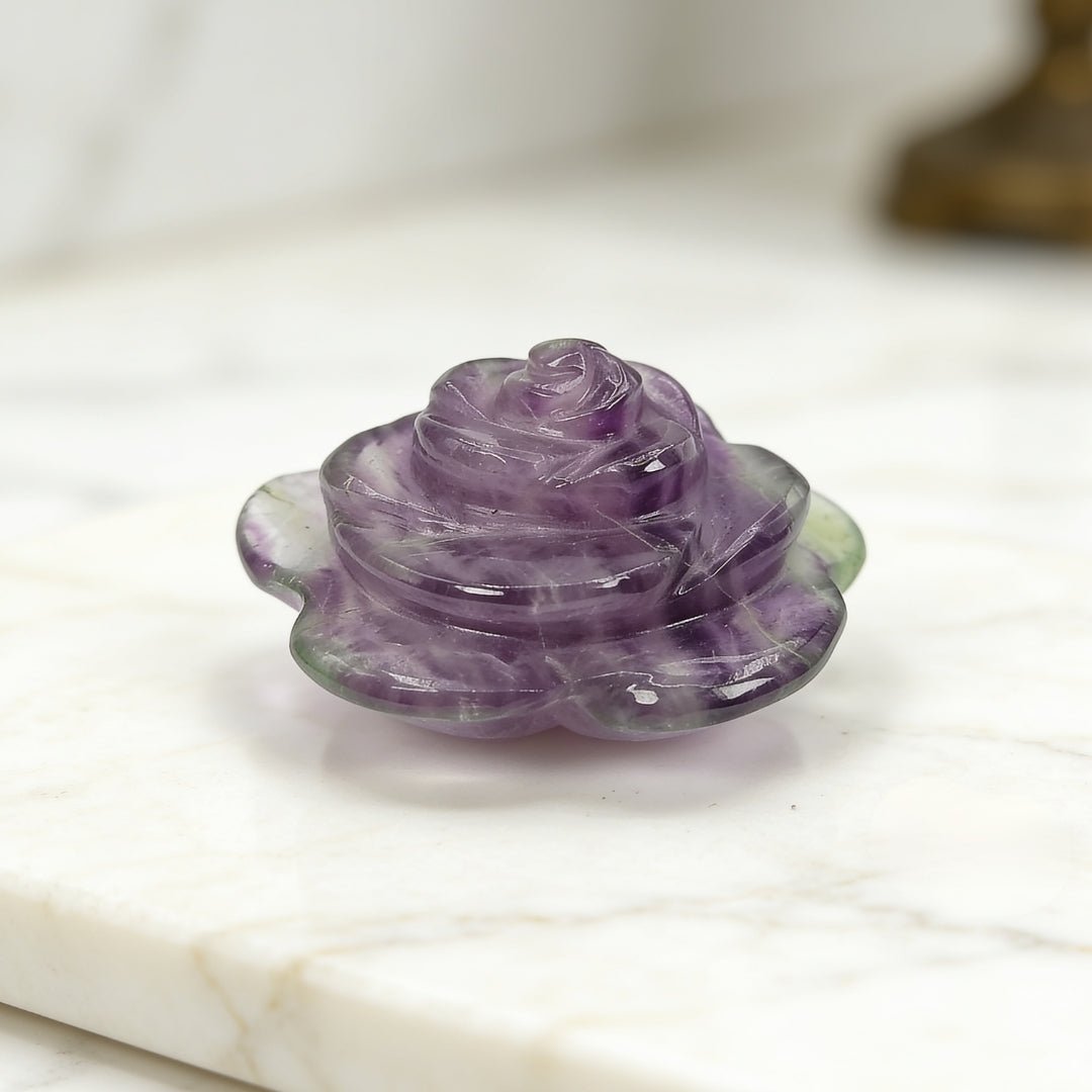 natural amethyst flower stone geode on a plain background