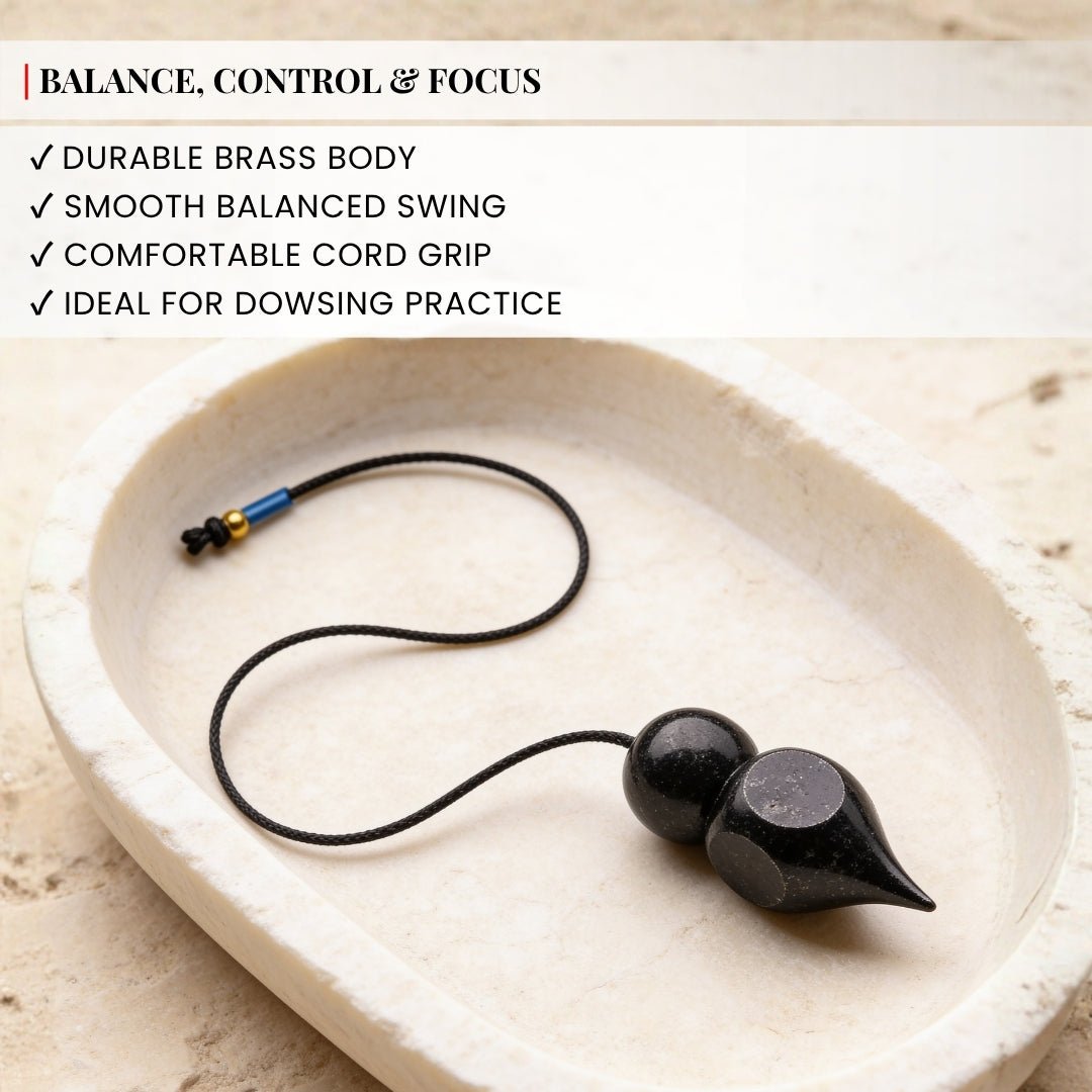top attachment detail of the black-coated brass dowsing pendulum