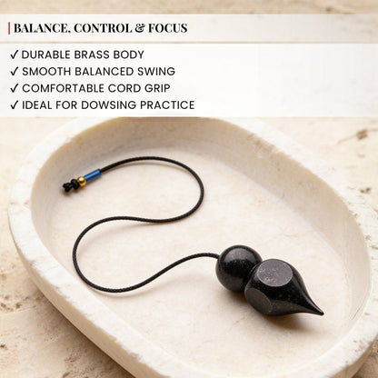 top attachment detail of the black-coated brass dowsing pendulum