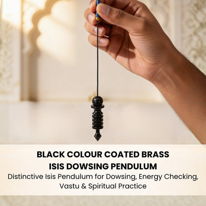 black-coated brass Isis pendulum resting in the palm for scale