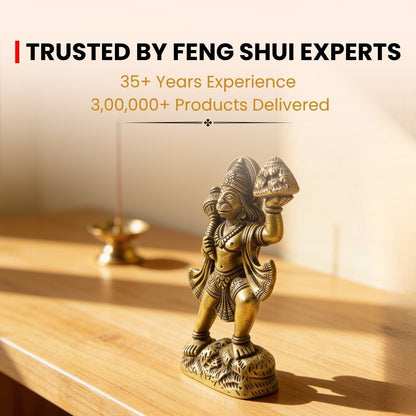rear detailing and base of the brass Hanuman with mountain idol
