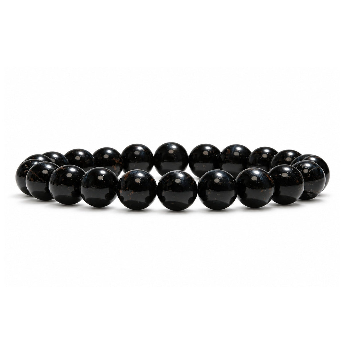 Close-up of 8 mm smooth round beads showing natural silky chatoyancy and shimmering midnight-blue optical bands