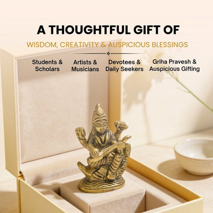 Compact 2.5-inch brass Saraswati murti held in palm showing petite scale, solid metallic weight, and antique golden luster