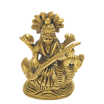 Scale measurement graphic showing 3.5 inch vertical height, base width, and depth of solid brass Saraswati statue