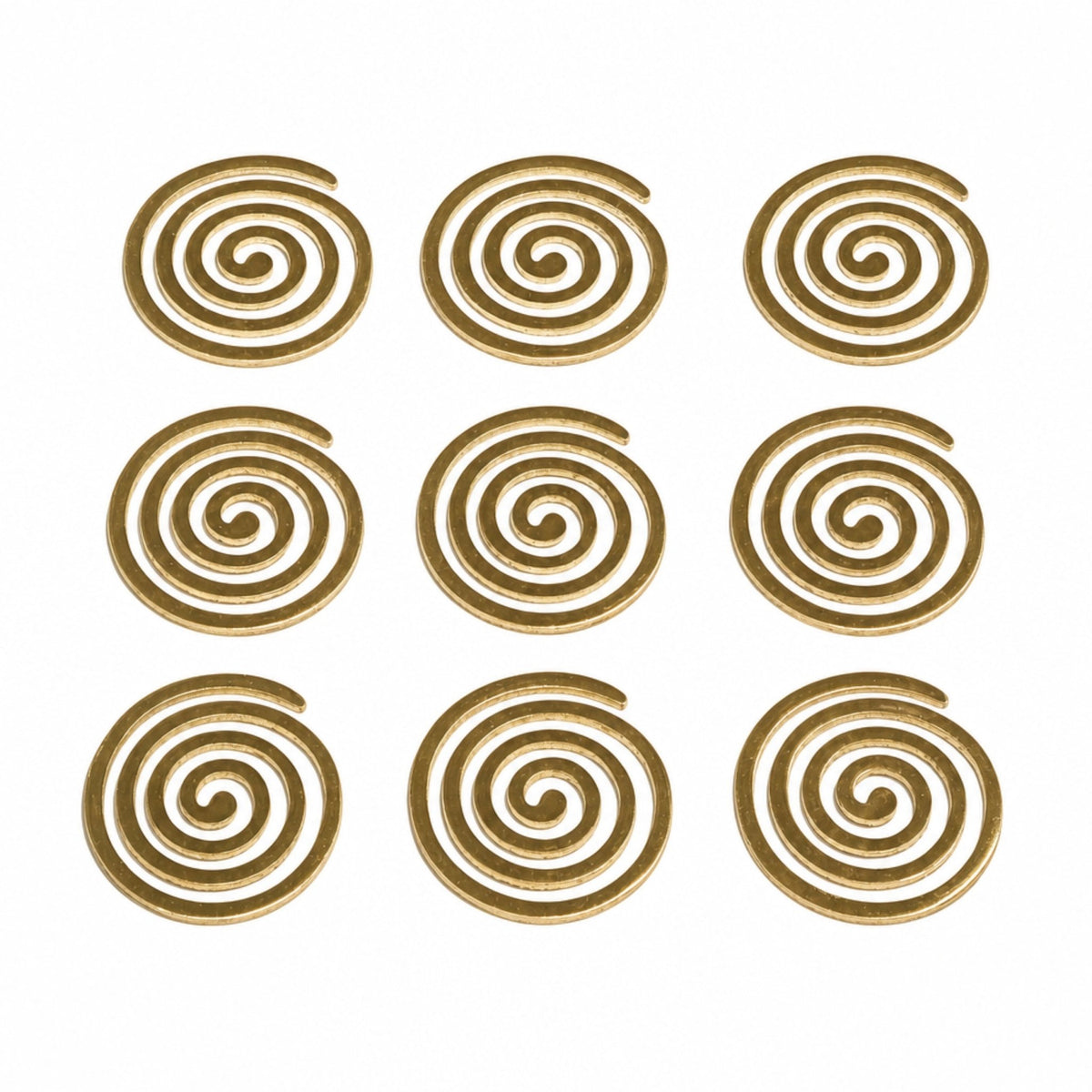 Detailed macro shot of authentic cast brass metal surface showing warm golden polish, concentric spiral ridges, and lustrous metallic finish