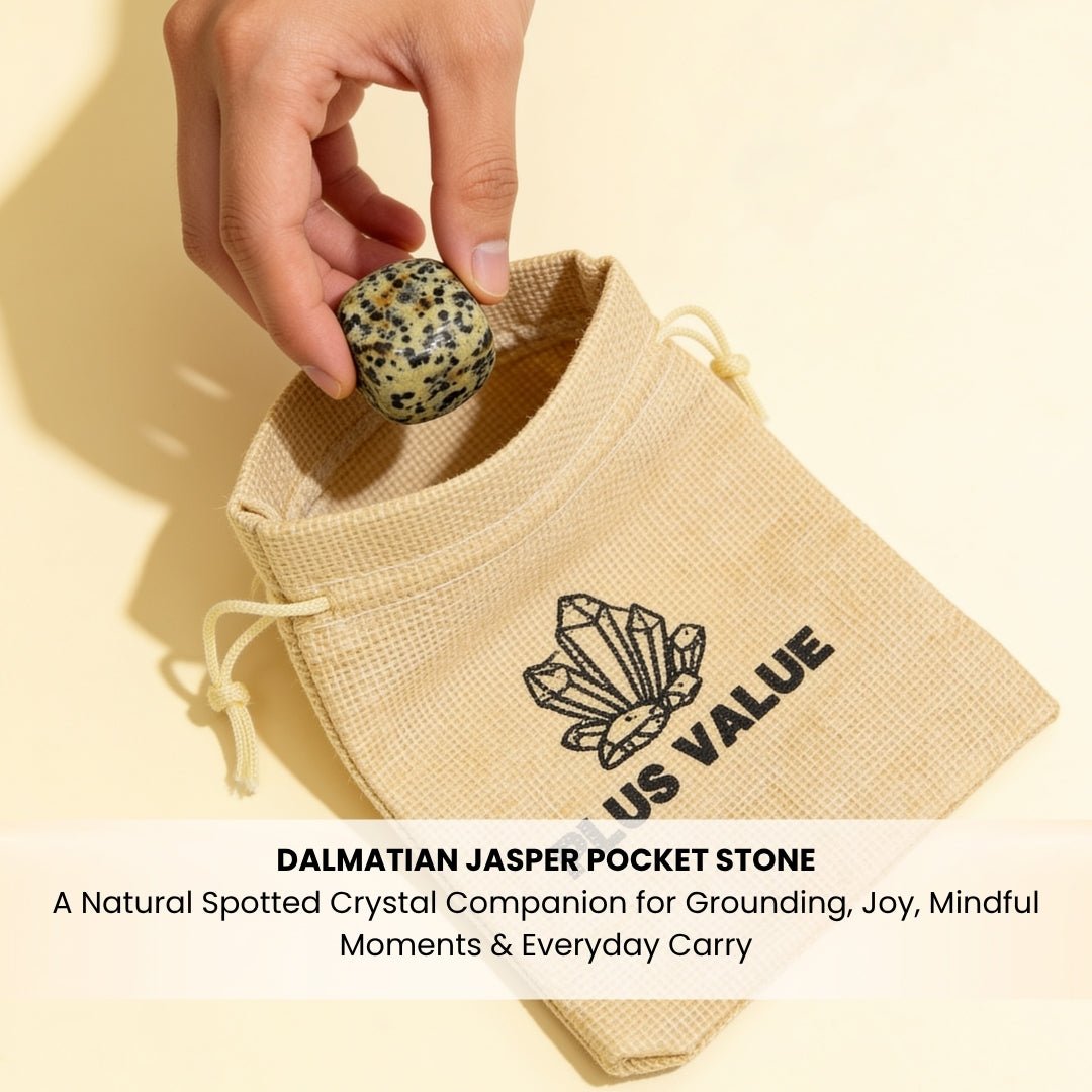 Dalmatian Jasper pocket crystal being slipped into pocket for daily carry