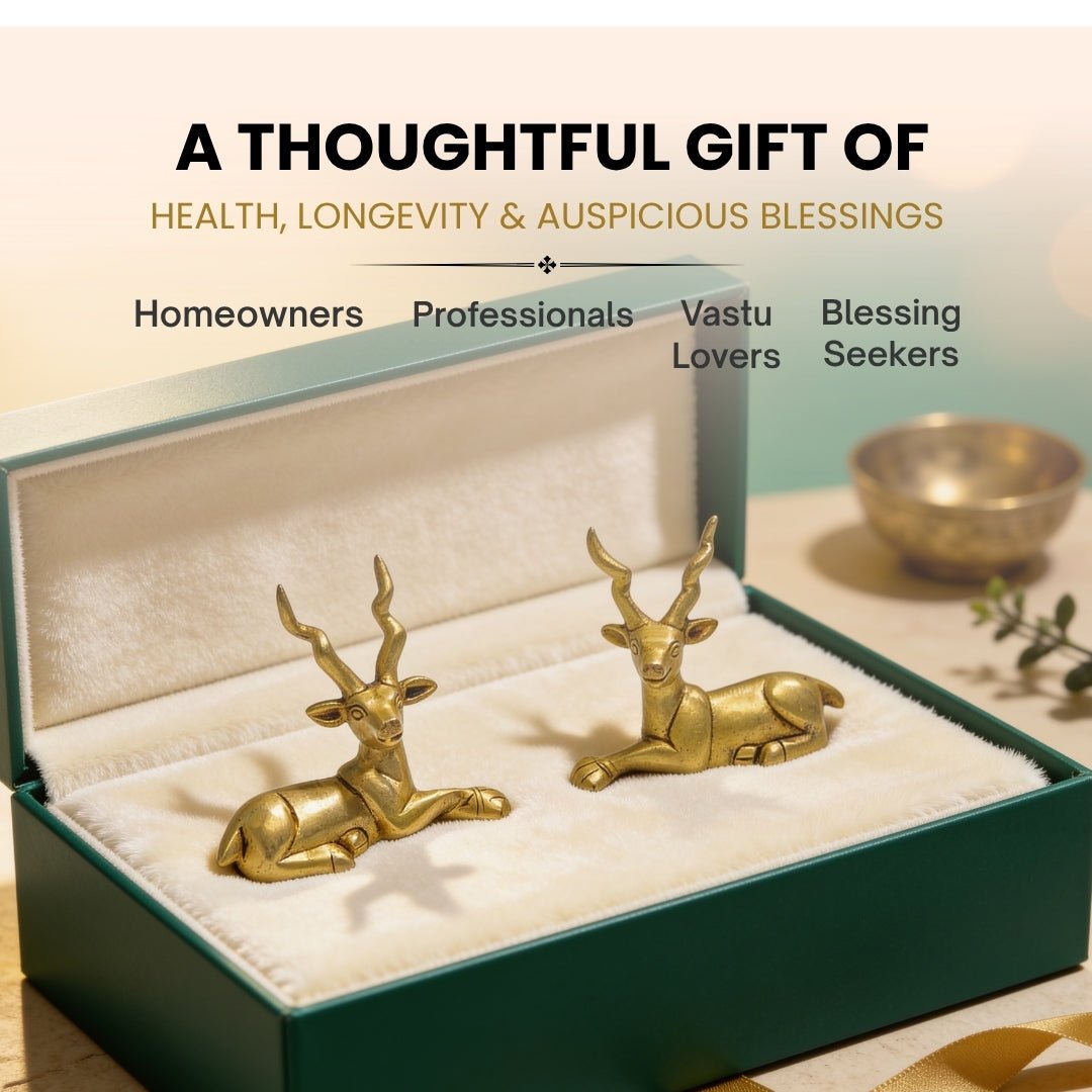 Solid brass deer figurine held in palm demonstrating compact tabletop size, substantial metal density, and polished finish