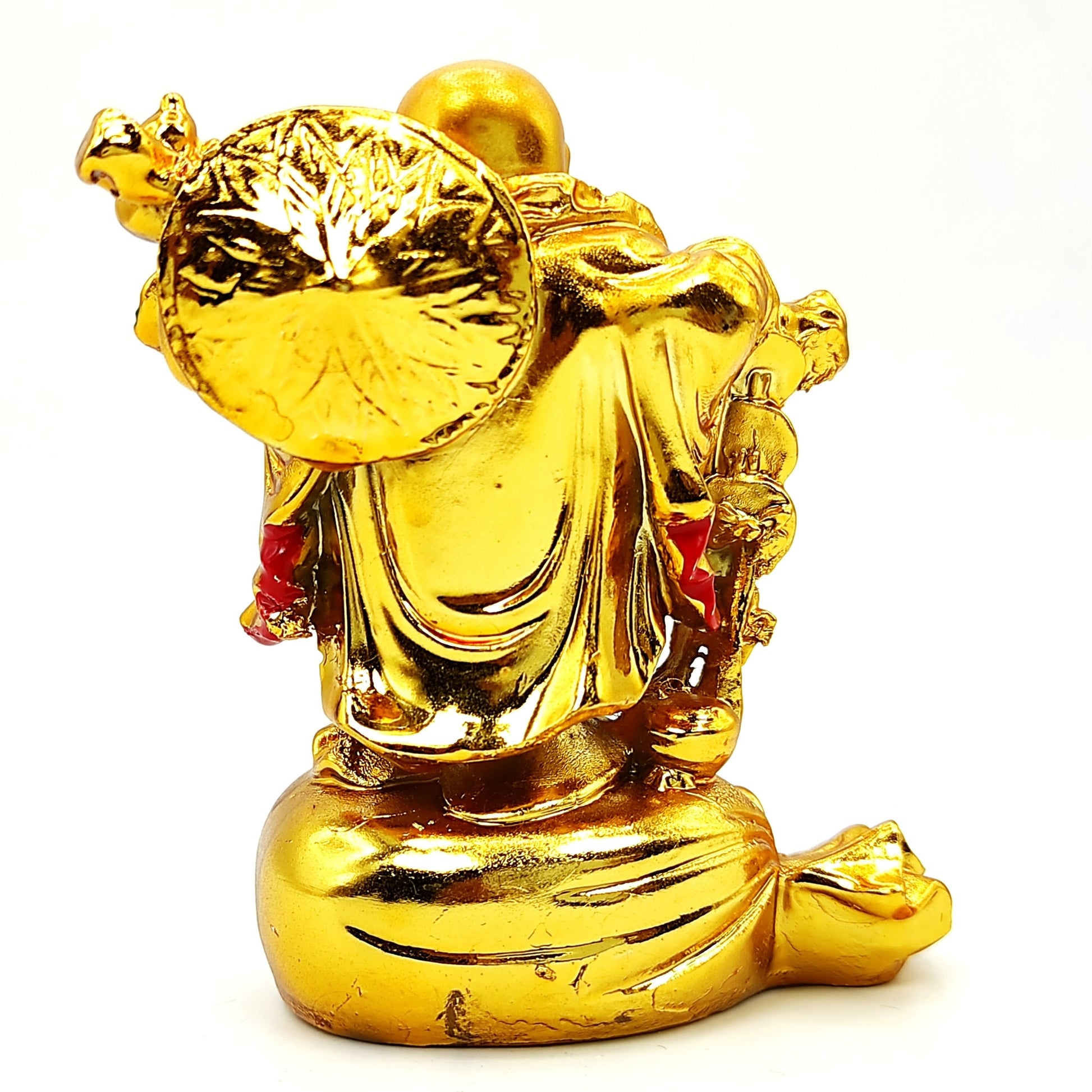 feng shui remedy laughing buddha with coin bag