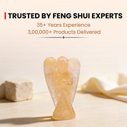 Smooth flat base of carved angel figurine ensuring stable standing display