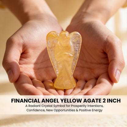 2 inch Yellow Agate pocket angel resting in open palm for size reference