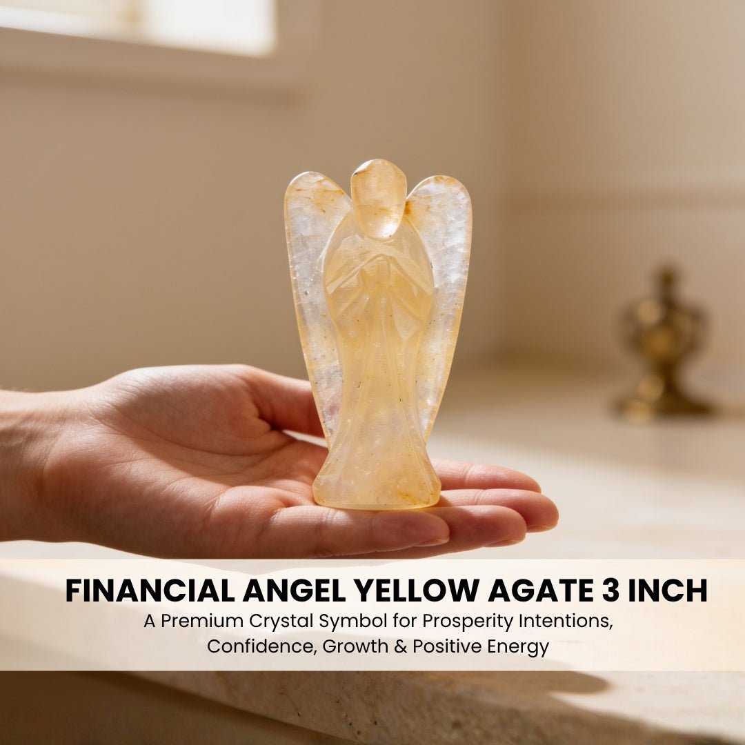 3 inch Yellow Agate angel held in adult palm showing substantial size and weight scale