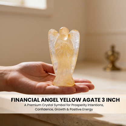 3 inch Yellow Agate angel held in adult palm showing substantial size and weight scale