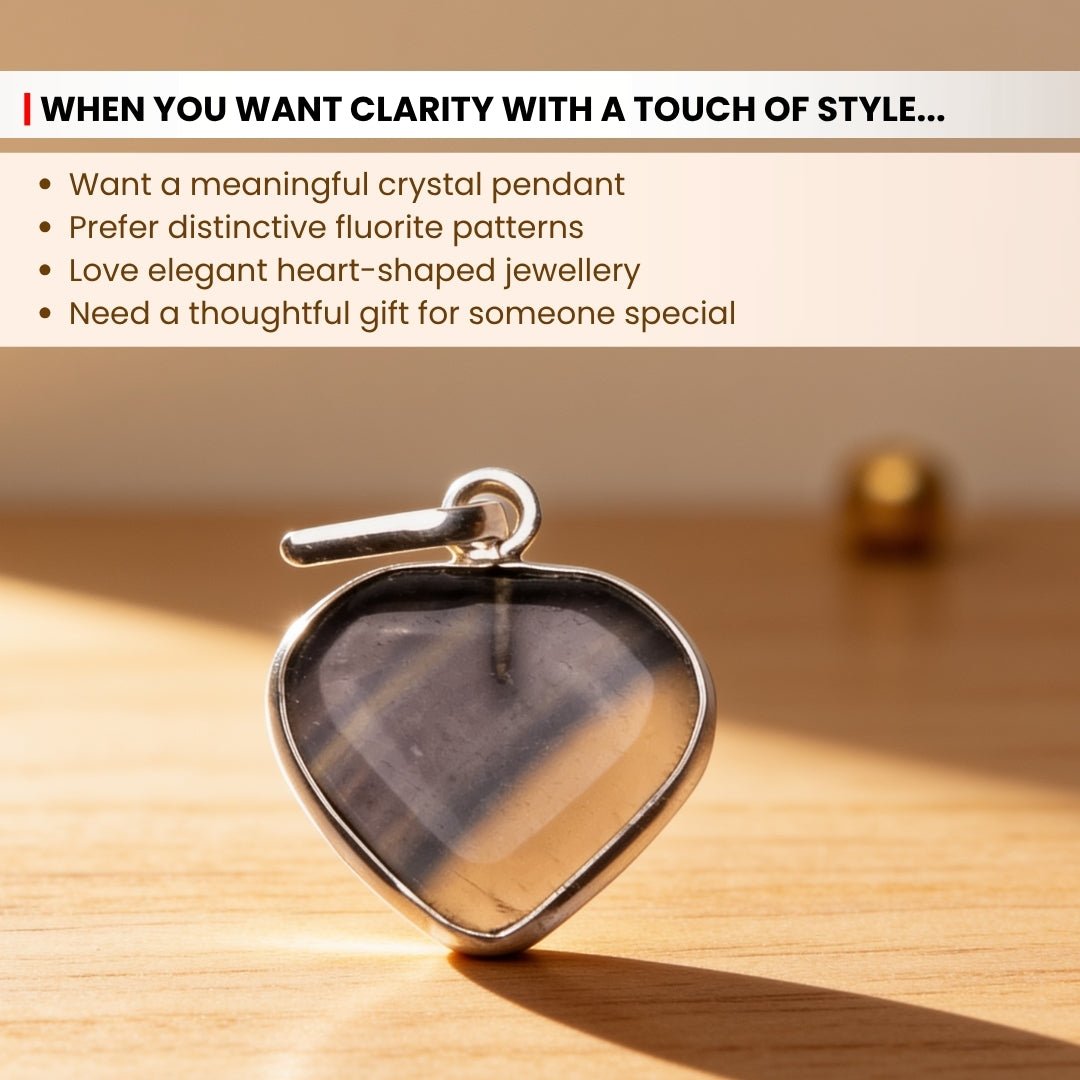 Secure silver-toned bail detail securely mounted to the Fluorite heart pendant