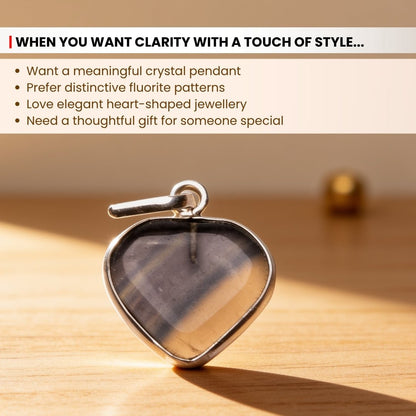 Secure silver-toned bail detail securely mounted to the Fluorite heart pendant