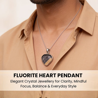 Rainbow Fluorite heart pendant resting gracefully on collarbone for scale