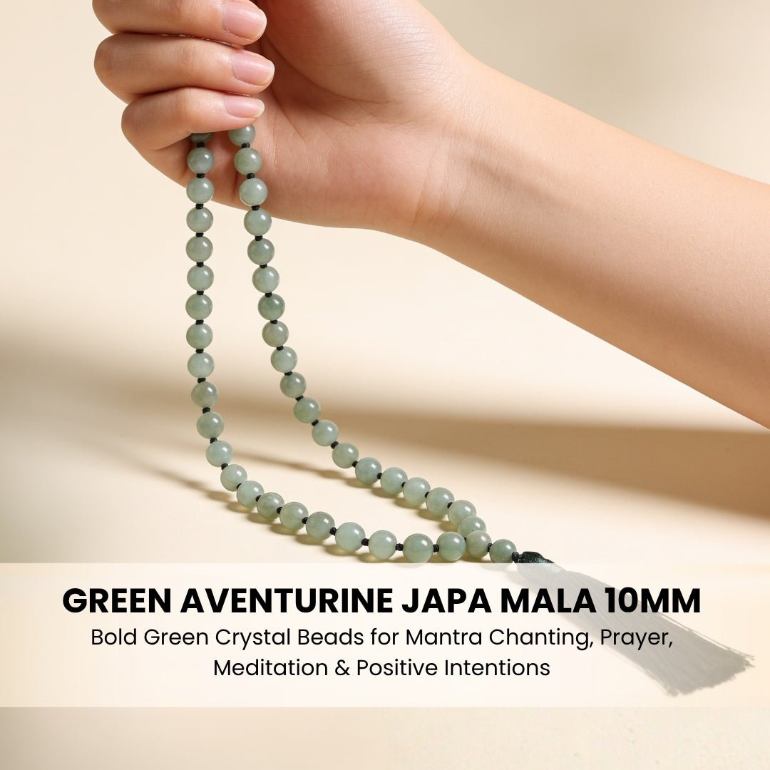 Prominent polished guru bead and matching green silky tassel finish on japa mala