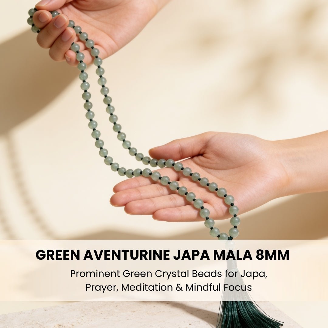 Polished guru bead and matching green silky tassel finish on crystal japa mala