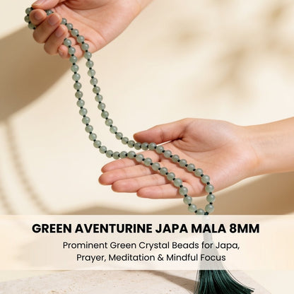Polished guru bead and matching green silky tassel finish on crystal japa mala