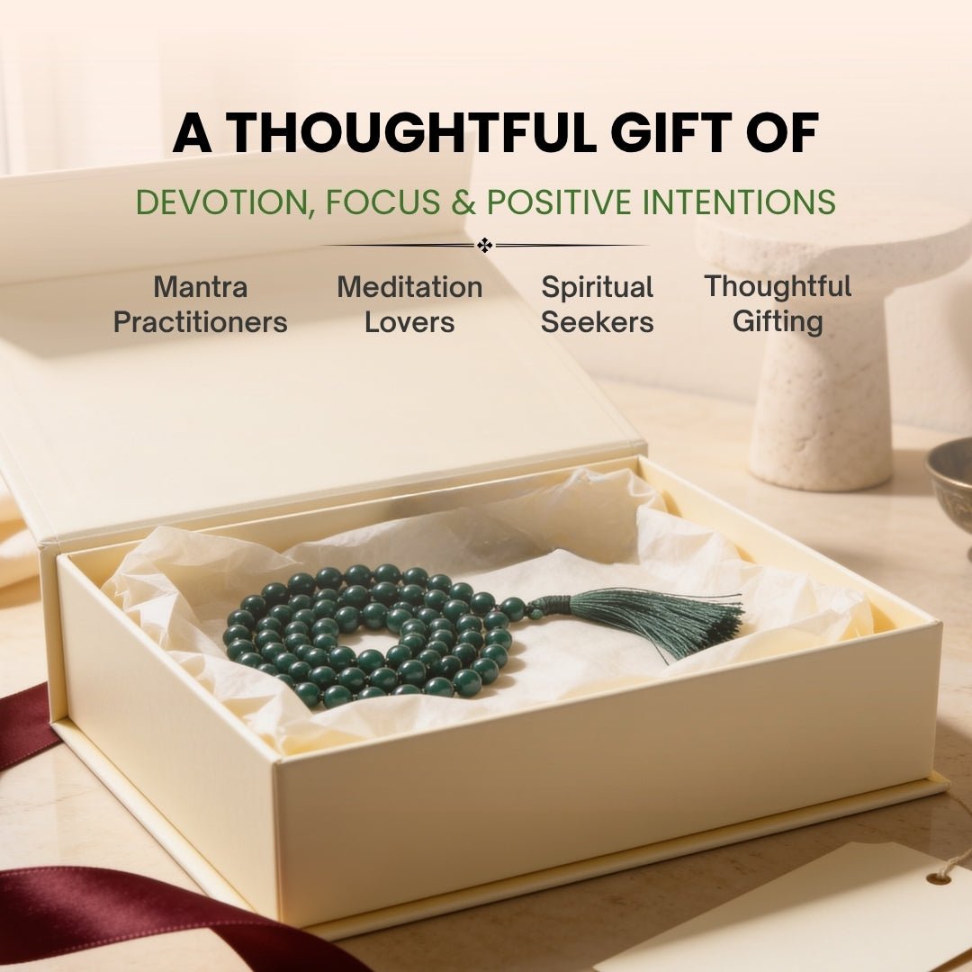 Substantial 10 mm Green Jade mala held in fingers during heart-centering mantra chanting