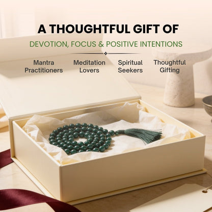 Substantial 10 mm Green Jade mala held in fingers during heart-centering mantra chanting