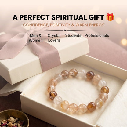 Warm honey crystal beads held against sunlight revealing luminous clarity and inclusions