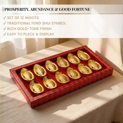 Set of 12 miniature Feng Shui gold ingots arranged neatly in a grid
