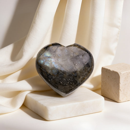 Natural polished Labradorite carved heart stone with iridescent blue and golden flash