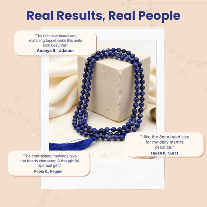 Overhead spiral arrangement of 108 Lapis Lazuli 8 mm beads beside a protective storage pouch