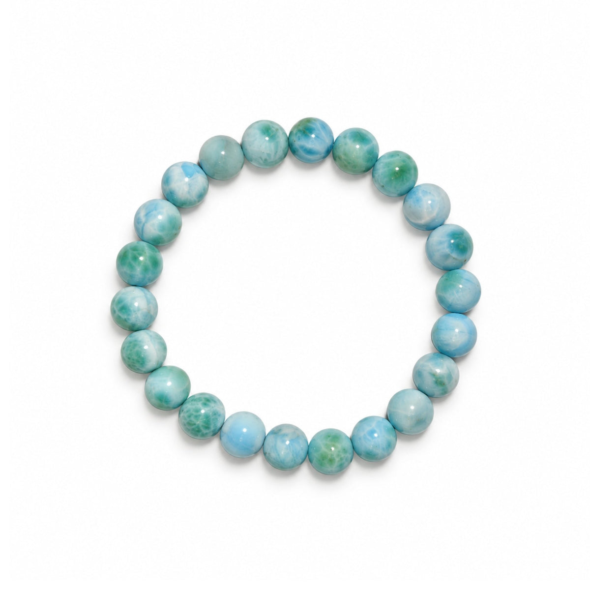 Close-up of 8 mm polished beads displaying genuine ocean-blue hues, cloudy white plumes, and smooth vitreous luster