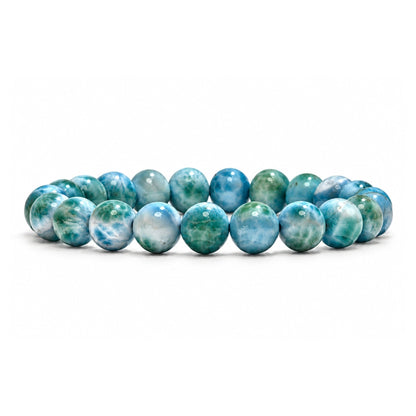 Natural Larimar 8 mm round bead stretch bracelet featuring soft Caribbean sky-blue and white swirling patterns