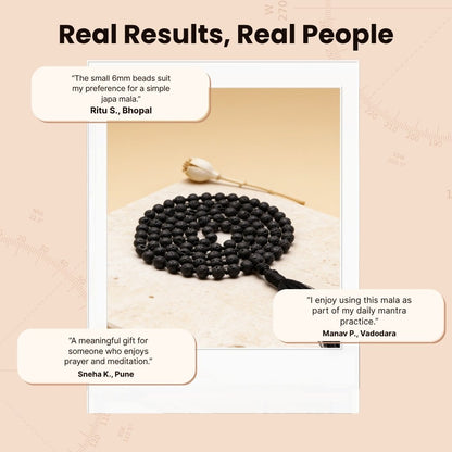 Overhead spiral arrangement of 108 black Lava beads beside a protective drawstring storage pouch