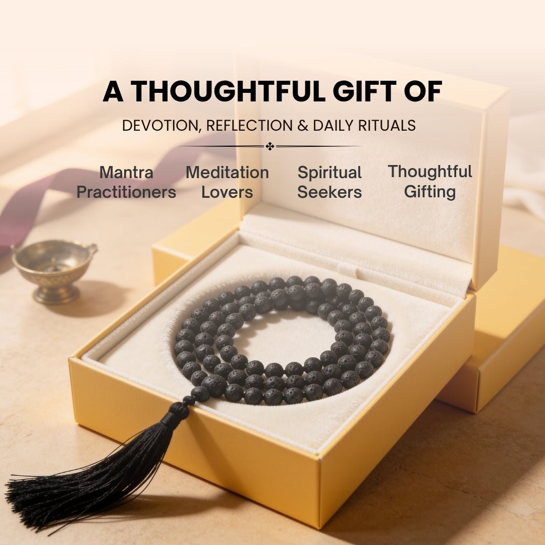 Essential oil drop diffusing into 8 mm porous Lava bead during Root Chakra meditation