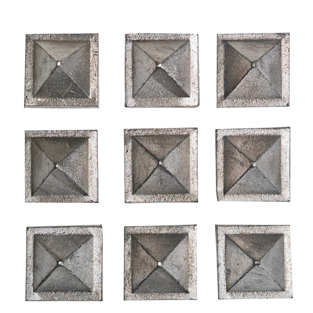 Detailed macro view showing authentic cast lead metal surface, natural matte grey sheen, and beveled pyramid facets