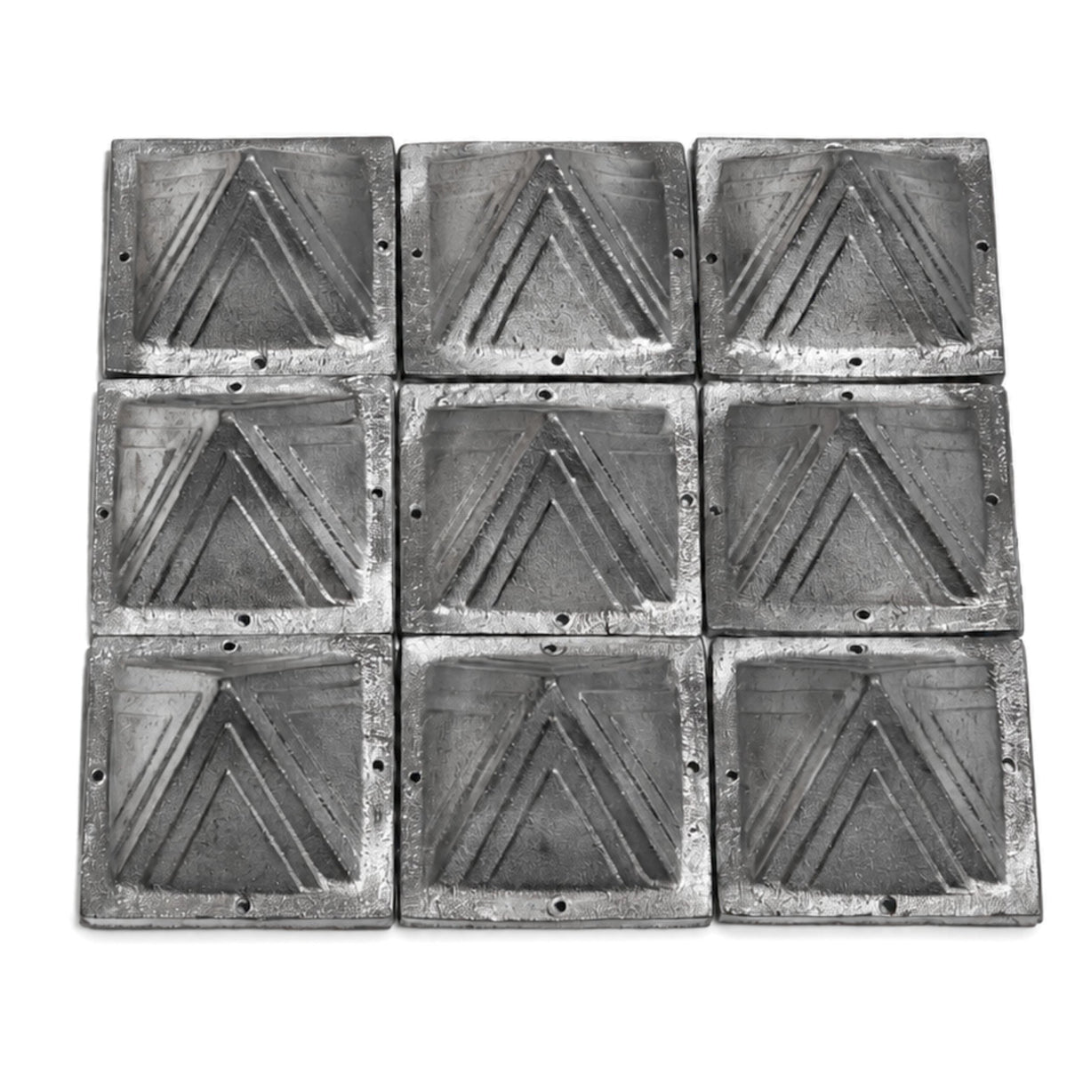 Energizing procedure showing 2.5-inch lead pyramid placed over a Vastu compass facing South-West with purifying dhoop smoke