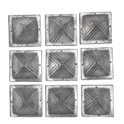 Solid lead pyramid positioned in the South-West corner of a room near a skirting board and desk to stabilize Earth energy