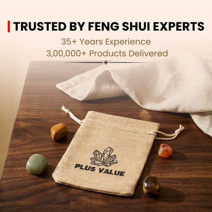 Pocket-sized luck and prosperity healing stones held in palm for purse, wallet, and cash box placement