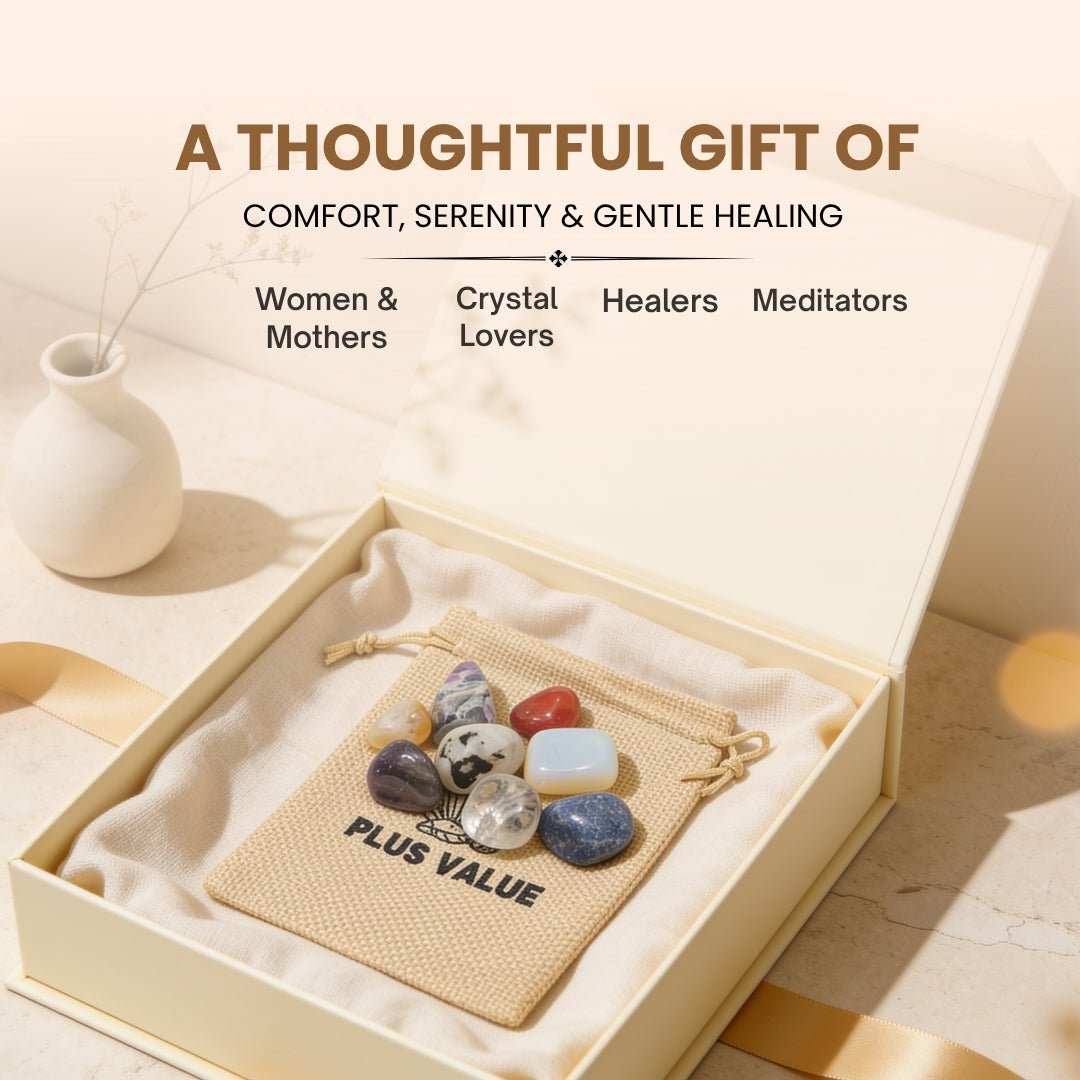 Assortment of smooth tumbled menopause support stones resting in palm demonstrating handheld scale, ergonomic shape, and tactile finish