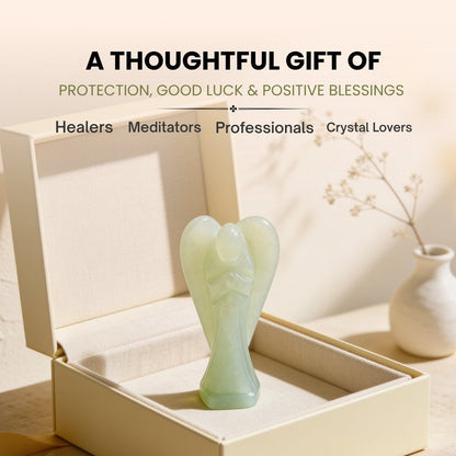 Petite 2-inch Green Aventurine guardian angel held in palm demonstrating compact pocket size, soothing green tone, and tactile feel