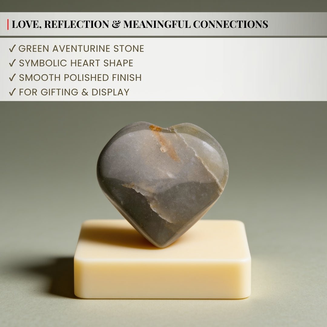 Smoothly rounded contours and hand-polished puffy edges of Green Aventurine carved heart crystal
