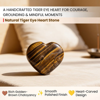 Close-up of polished Tiger Eye heart showing dynamic silky golden-yellow and warm brown chatoyant bands