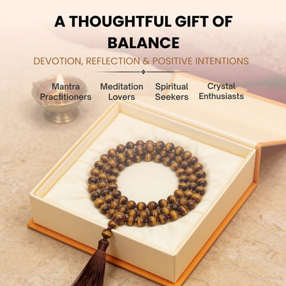 8 mm Tiger Eye mala held in fingers during Solar Plexus chanting, courage building, and focused meditation