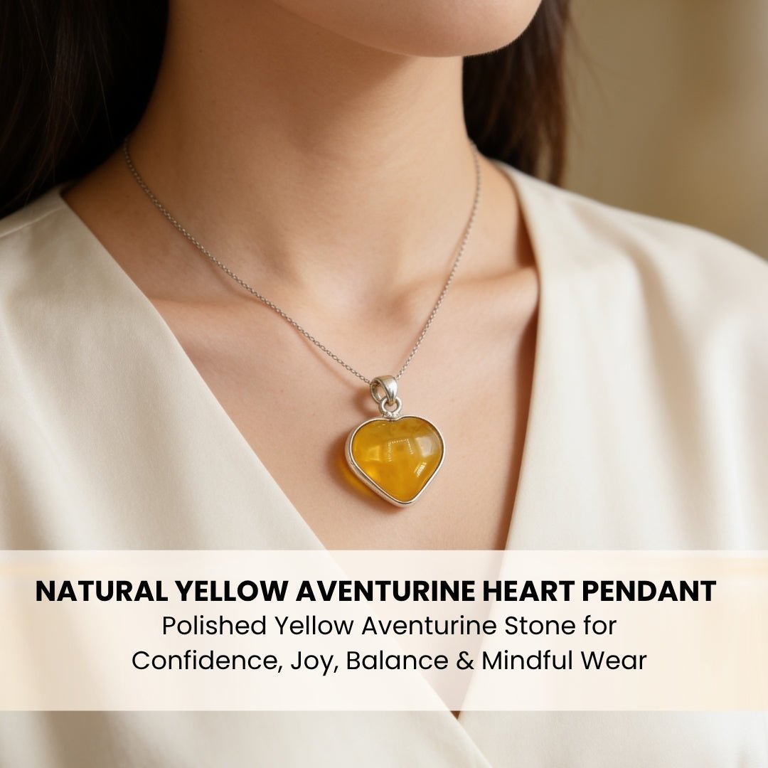 Yellow Aventurine heart pendant resting on chest demonstrating size proportions and everyday jewelry look