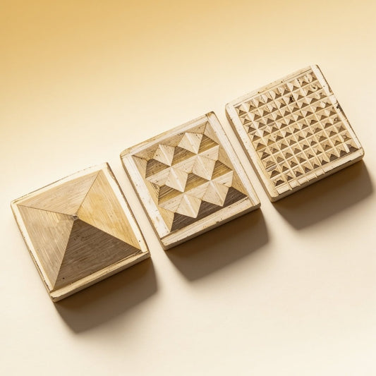 panchdhatu pyramid 1 inch vastu product on a plain background