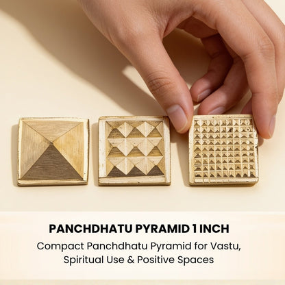 close-up of the five-metal panchdhatu pyramid surface