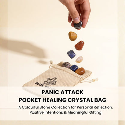 Hand holding smooth polished worry stones demonstrating tactile palm-size comfort for grounding during anxious moments