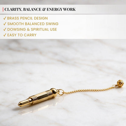24 gram brass pencil pendulum held in hand for scale