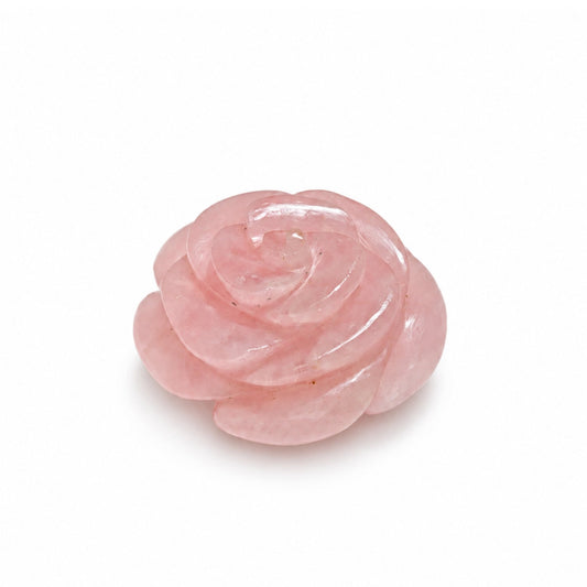 Hand-carved natural Pink Rose Quartz flower figurine displaying blooming open blossom petals