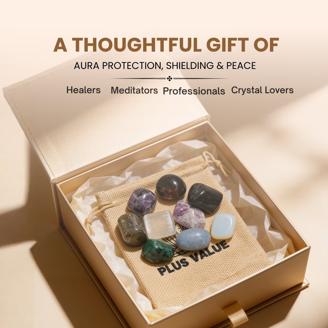 Assortment of smooth polished psychic protection crystals held in open hand demonstrating pocket-sized scale and tactile weight